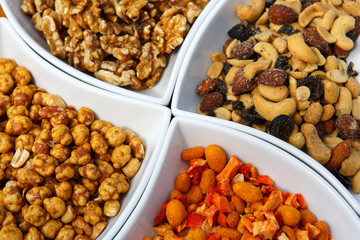 Different kinds of nuts as a salty snack