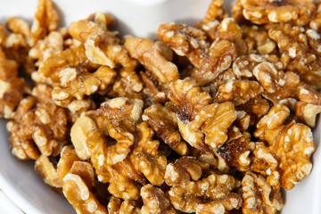 Walnuts in white bowl as healthy snack