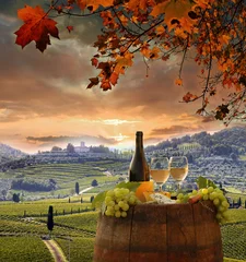 Tuinposter White wine with barell  in vineyard, Chianti, Tuscany, Italy © Tomas Marek