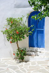 Traditional blue vintage Greek door in small village