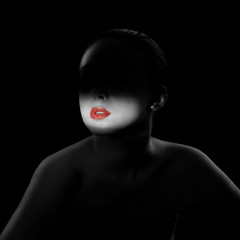 Black and white portrait of secret lady with red lips