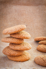 Stacked Brown Cookies On Rustic Background