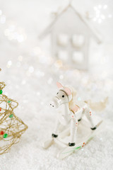 horse christmas decoration on white snow background