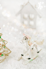 Fototapeta premium horse christmas decoration on white snow background