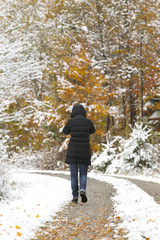 women walking in snow