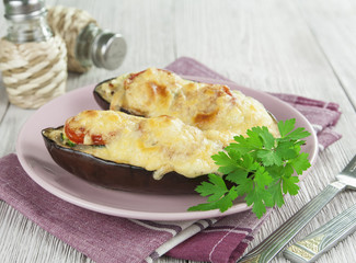 Eggplant baked with vegetables and cheese