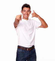 Fototapeta premium Handsome man in a studio pointing at you.