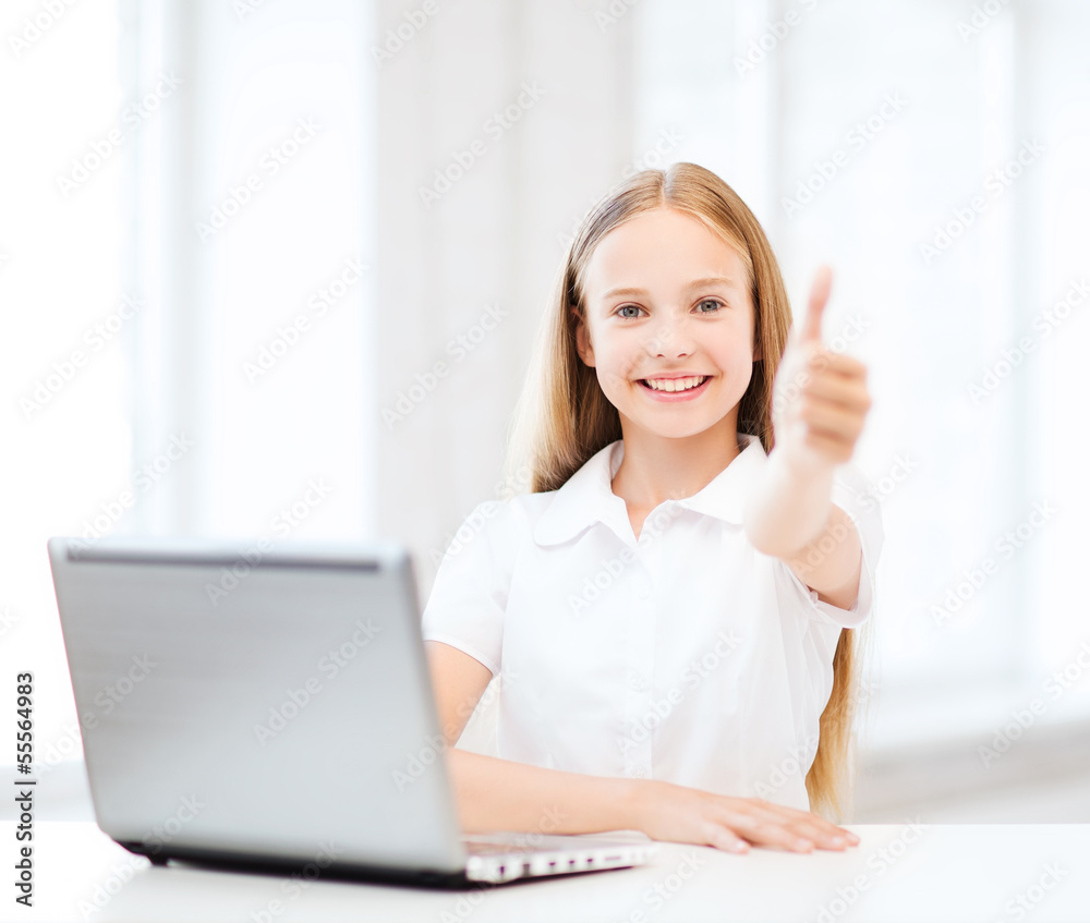 Wall mural girl with laptop pc at school