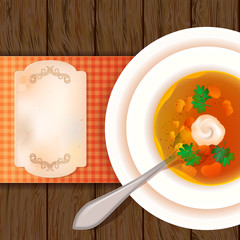 A plate of soup on a wooden table. View from above. Rustic style
