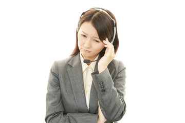 頭痛を訴えるオペレーター