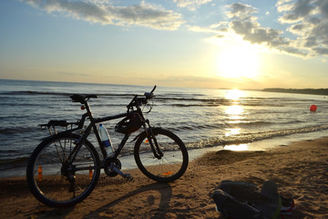Fototapeta premium Baltic Sea at sunset and bike