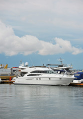 White motor yacht over harbor pier, Odessa, Ukraine