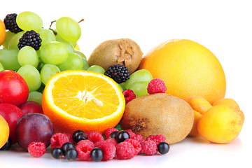 Fresh fruits and berries isolated on white