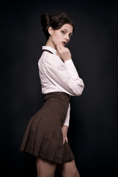 teen school girl wearing old style formal clothes