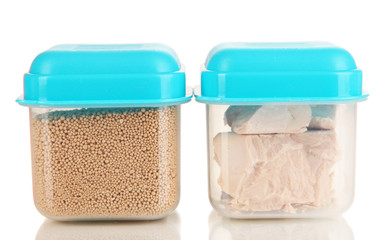 Dry yeast in containers isolated on white