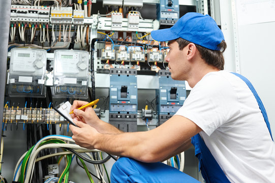 electrician worker inspecting