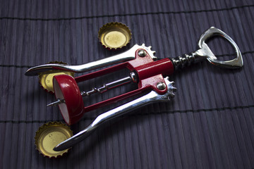 cap drink opener on wicker mat