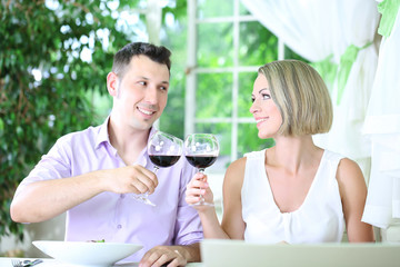 Beautiful couple having  romantic dinner at restaurant