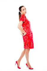 young and beautiful woman in a red Chinese dress
