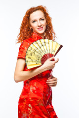 young and beautiful woman in a red Chinese dress