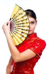 young and beautiful woman in a red Chinese dress