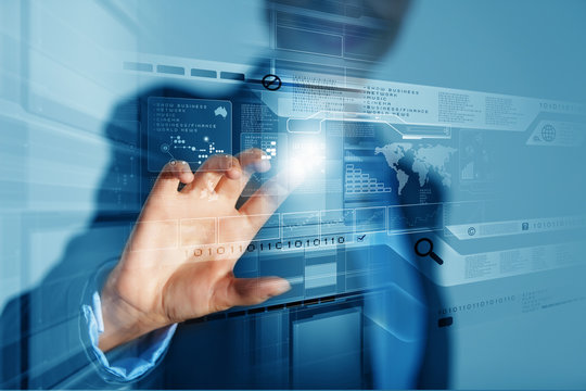Businessman touching icon