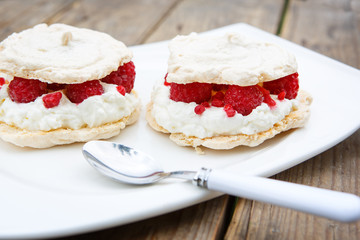 Pear cake stuffed with jam and covered with white meringue