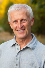 Closeup portrait of happy face of old man
