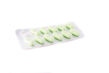 Medicine pills into boxes in white background