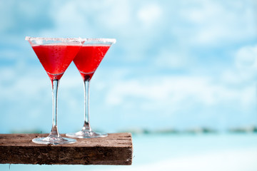 red drink on beach