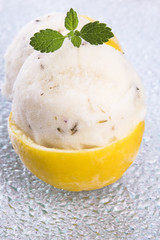 lemon sorbet with lavender in cups of lemon