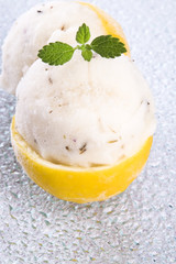 lemon sorbet with lavender in cups of lemon