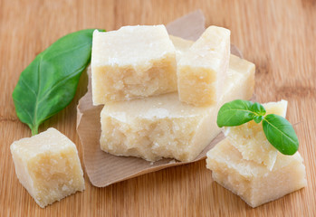 Parmesan cheese and basil leaves