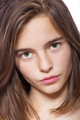 Obraz premium closeup portrait of a teenage girl isolated on white