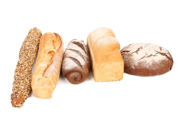 Brown and white loafs of bread.