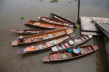 wooden row boat at the pier