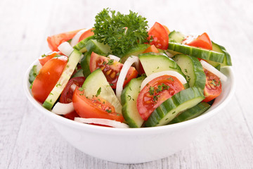 tomato salad with cucumber and parsley