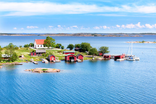 Small village with red buildings in Finnish archipelago