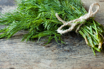 bunch of dill on old boards