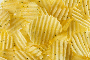 Delicious potato chips with spice