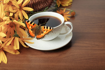 Coffee, butterfly and flowers