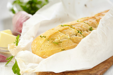 Baked garlic bread with herbs