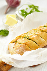 Baked garlic bread with herbs
