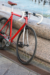 Fototapeta na wymiar Parked red bike