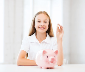 child with piggy bank