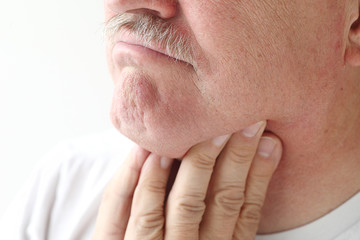 Fototapeta premium closeup of man with sore throat