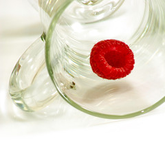 raspberries in a glass