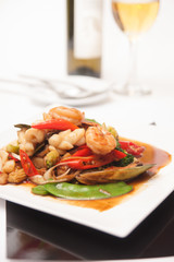 Thai stir fried seafood with tom yum sauce.