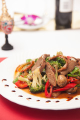 Stir fried grill duck with black pepper.