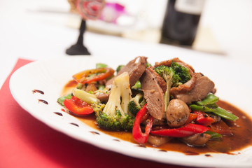 Stir fried grill duck with black pepper.